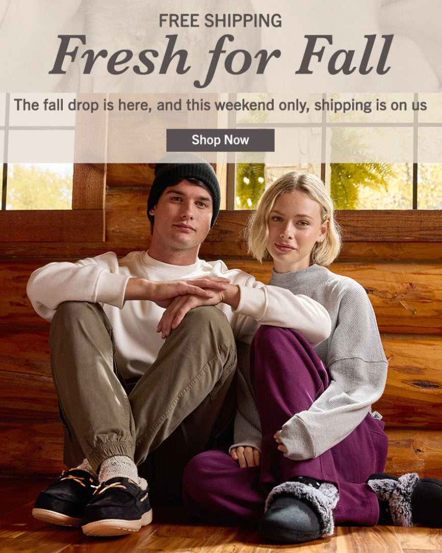 A promotional banner featuring a woman in a fur-trimmed coat and sunglasses, a man in a beanie and sweatshirt, and overlaid text reading 'FREE SHIPPING Fresh for Fall' with a 'Shop Now' button.