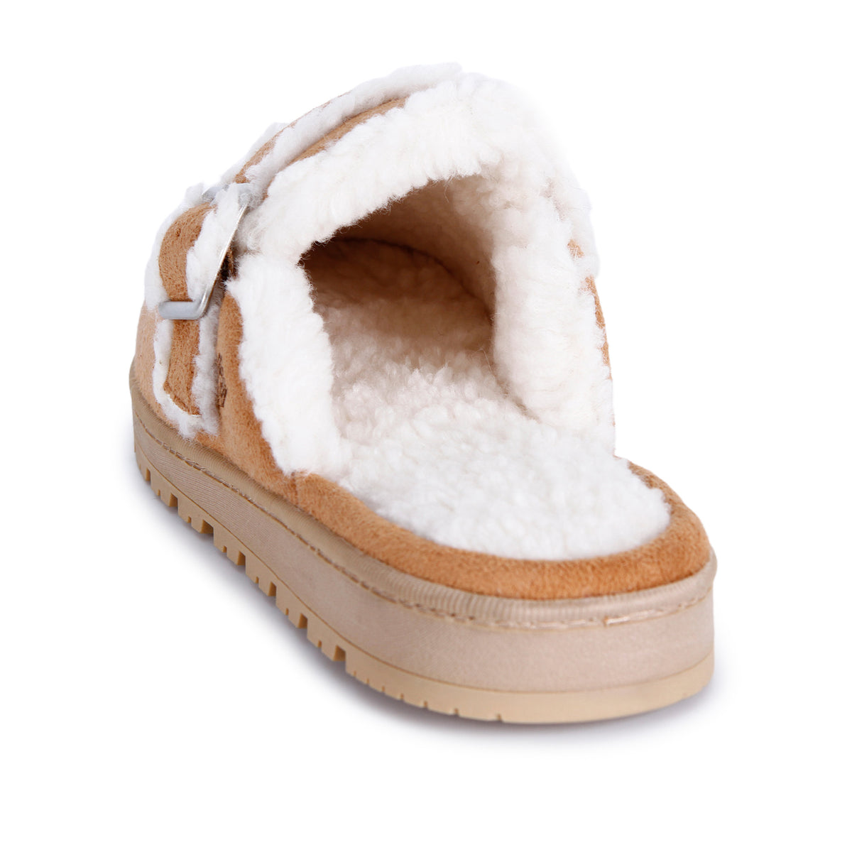 A tan suede clog-style slipper with white shearling lining and a silver buckle strap, shown on a plain white background.