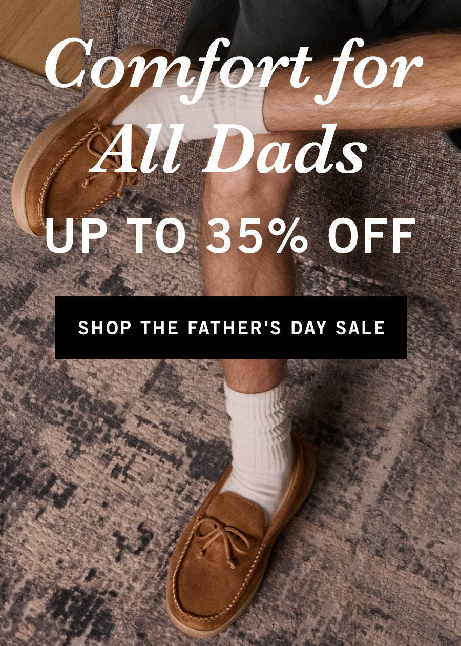Person wearing brown shoes and a gray sweater with text promoting a Father's Day sale.