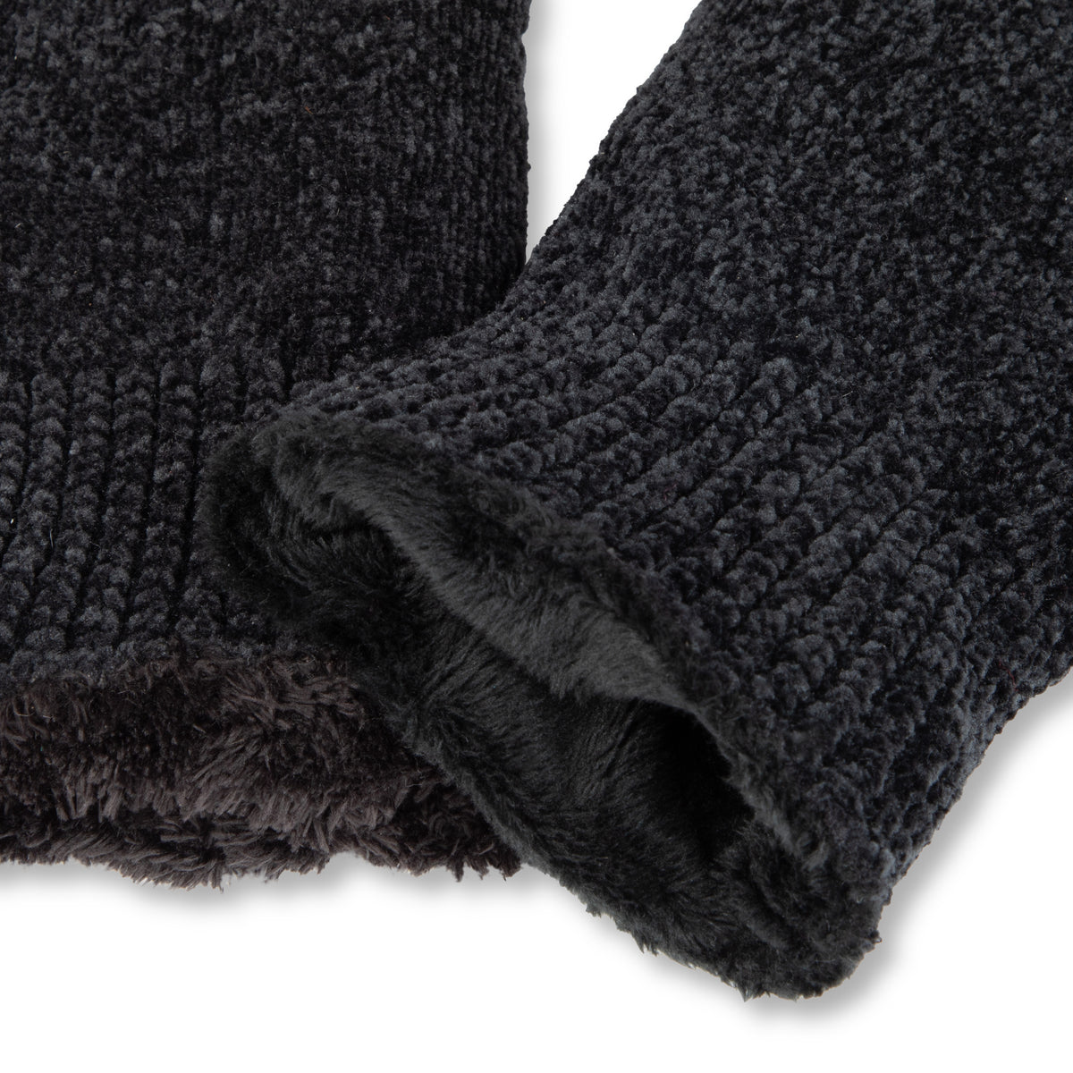 A pair of black knit winter gloves shown against a plain white background, with one glove displaying the textured knit body and the other showing a smooth black palm patch.

