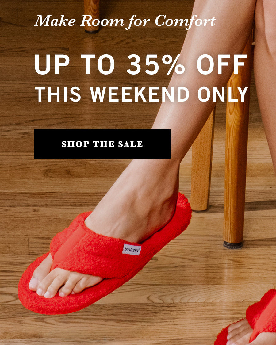Person wearing red slippers on a wooden floor with promotional text overlay.