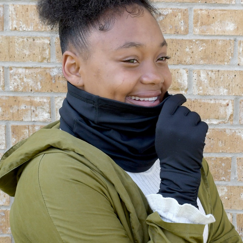 Women’s Antimicrobial Touchscreen Glove with Watch Vent in Black on figure. Model wearing glove and Women&