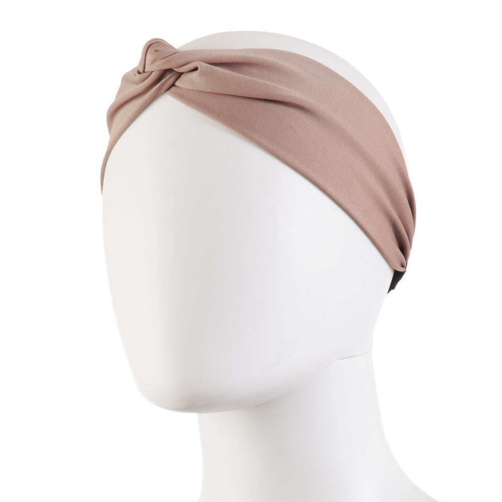 Women’s Recycled Water Repellent Spandex Twist Headband in Winter Blossom on mannequin head
